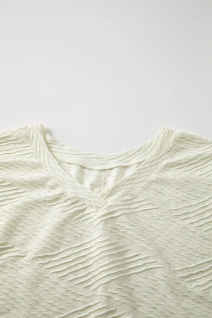 Effortless Elegance- Beige V-Neck Oversized Split Hem Top