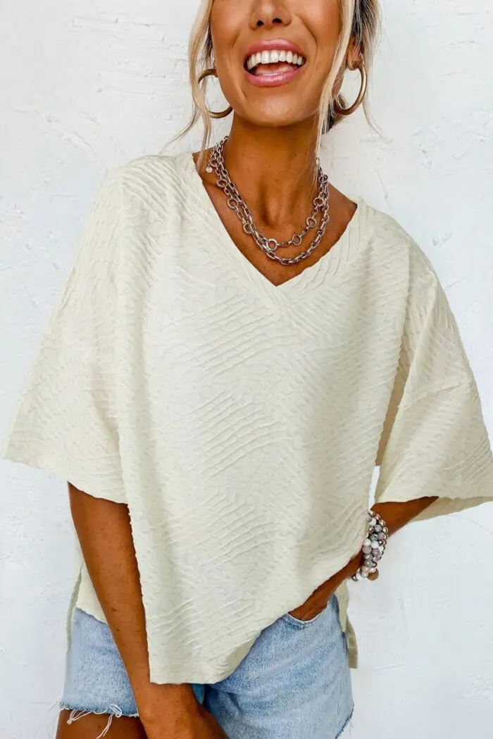 Effortless Elegance- Beige V-Neck Oversized Split Hem Top