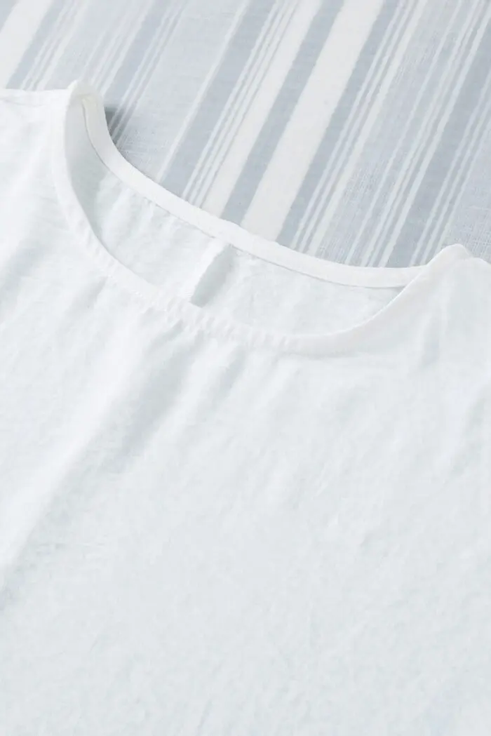 White Shift Top with Elegant Smocked Wrist Detail