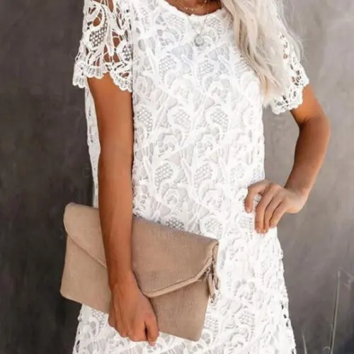 Elegant Round Neck Hollow Lace Midi Dress with a Casual Twist