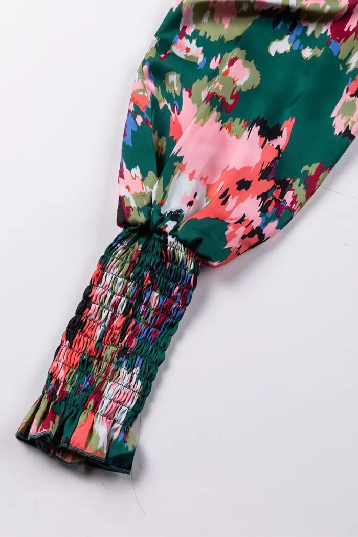 Chic Green Blouse with Abstract Print, Smocked Cuffs, and Frilled Neckline