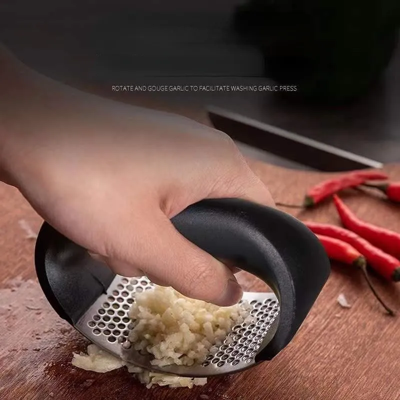 Handheld Garlic Mincer and Versatile Fruit and Vegetable Chopper - Must-Have Kitchen Tool