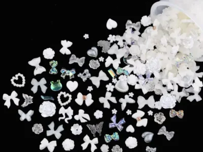 100Pcs Assorted Nail Charms: Multi-Color Pink, Purple, and White with Various Shapes - Including Hearts, Flowers, Bowknots, and Bear Designs for Creative Nail Art Manicures