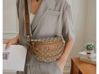 Elevate Your Style with our Fashionable Patterned Fanny Packs for Women - Featuring Stylish Letter Prints, Chain Details, and a Wide Strap for a Versatile Crossbody Bag