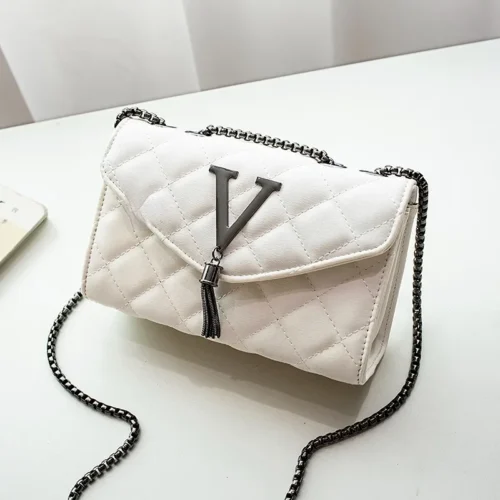 Timeless Elegance: Black Luxury PU Leather Handbags for Women with Plaid Pattern, Tassel, and Quilted Design