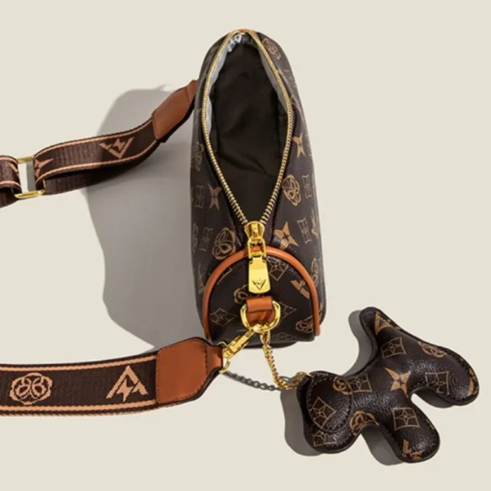 A Fashion-Forward Women's PU Leather Crossbody Bag Featuring a Charming Decorative Puppy Dog Accent