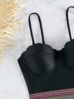 Sleek Black Shell-Inspired One-Piece Swimsuit