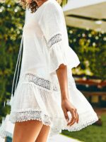 Stylish White Mid-Length Beach Skirt with Mid-Sleeved Top and Sunscreen Shirt Stitching