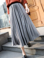 Gold Velvet Pleated Skirt Featuring a Wide Hem