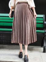 Gold Velvet Pleated Skirt Featuring a Wide Hem