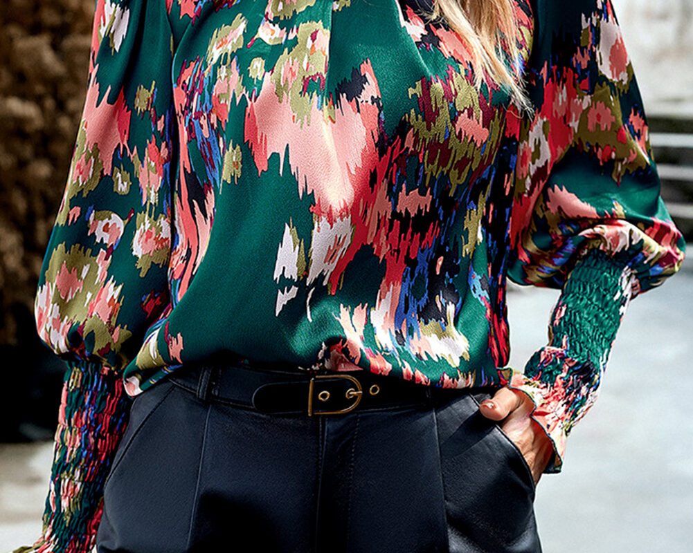 Chic Green Blouse with Abstract Print, Smocked Cuffs, and Frilled Neckline