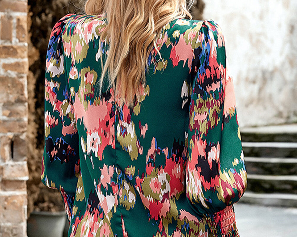 Chic Green Blouse with Abstract Print, Smocked Cuffs, and Frilled Neckline